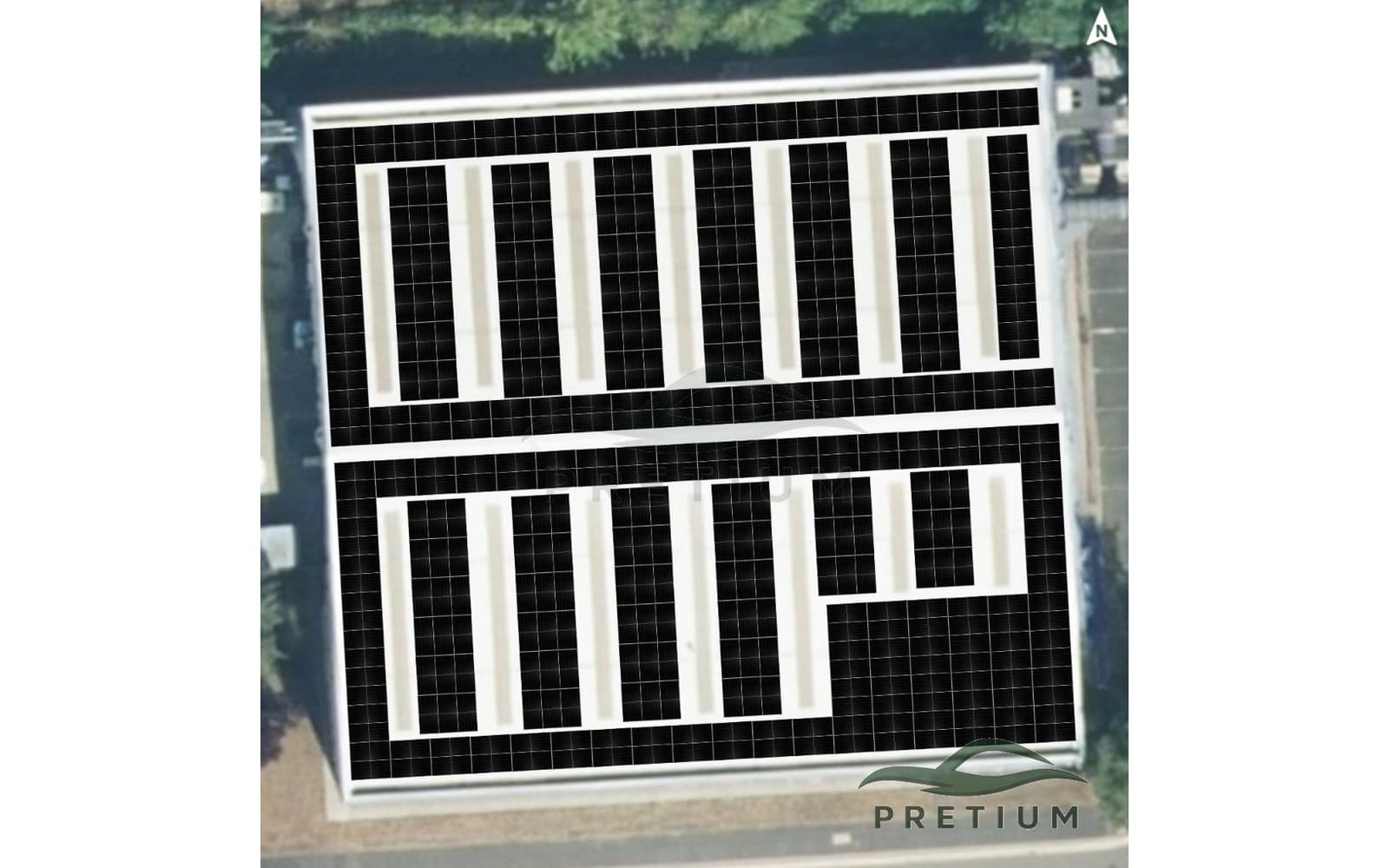 Aerial view of a commercial rooftop solar PV layout with access routes and roof openings